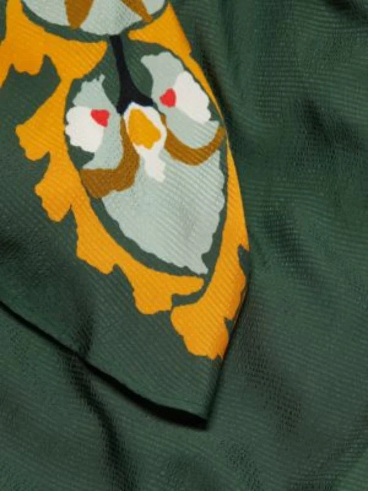 Dunkelgrünes bedrucktes Maxikleid