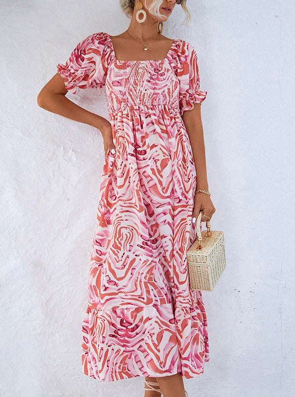Gesmoktes schulterfreies Midikleid mit Print