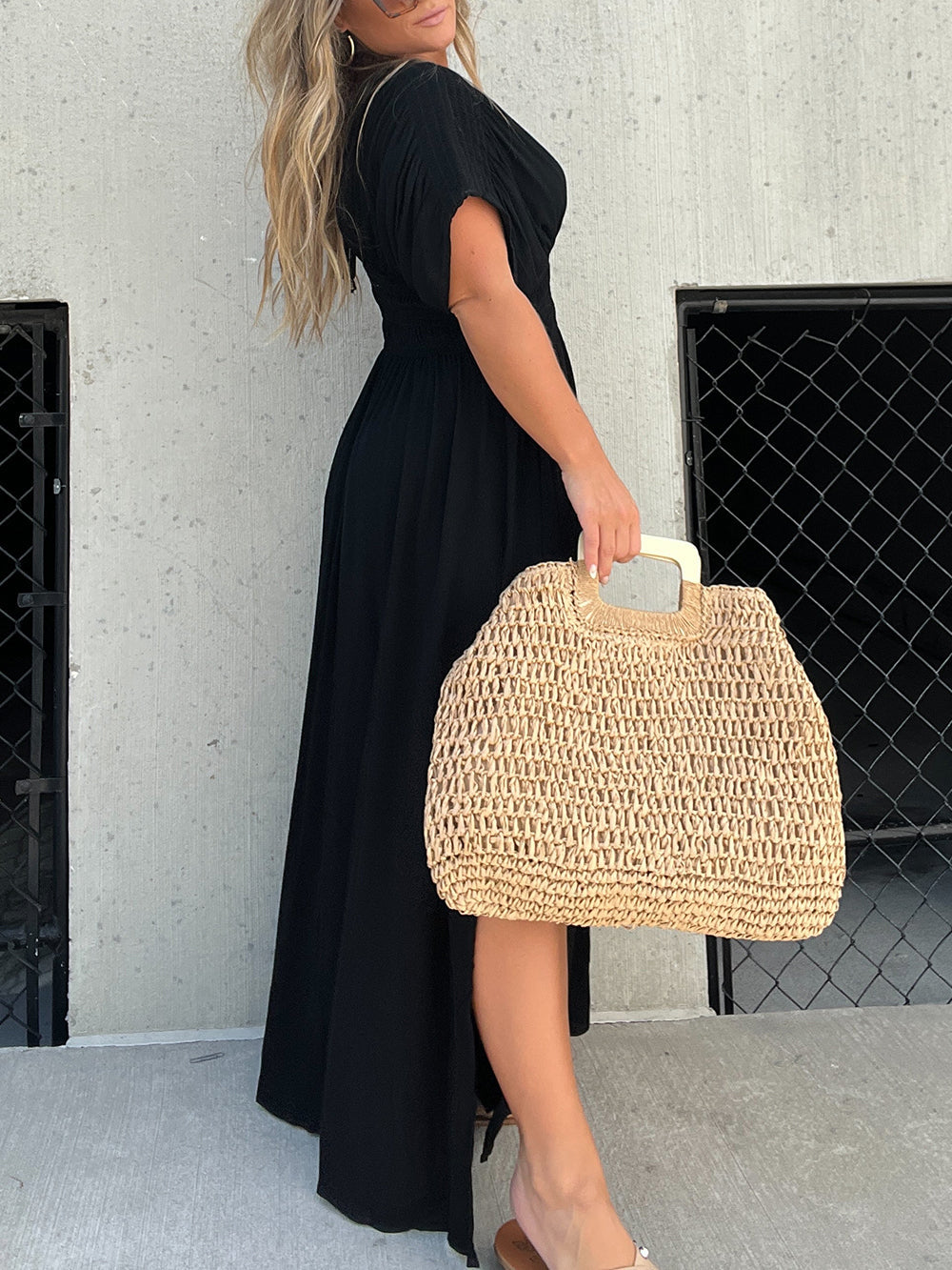 Schwarzes Maxikleid mit gebrochenem Herzen
